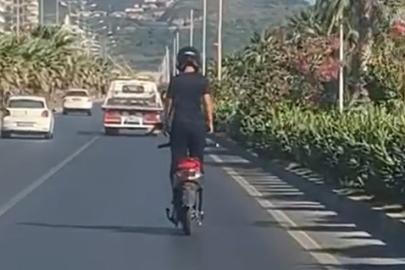 Elektrikli motosiklet sürücüsünün tehlikeli yolculuğu